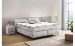 Boxspringbett Dany Mix in der Farbe Hellgrau in einem Zimmer