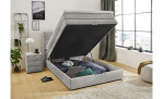Boxspringbett Antonia de Luxe in der Farbe Hellgrau im Schlafzimmer mit geöffnetem Bettkasten