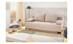 Schlafsofa „Feye“ (Tiefe 90 cm) mit 2 Kissen in einem hellen Wohnzimmer, Korb, Lampe und Kissen auf einem Teppich.