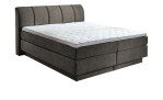 Boxspringbett Ole in Taupe aus einem Stoffbezug.