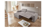 Wohnlandschaft Leona in Grau mit Relaxfunktion und Ottomane links, fotografiert im modern eingerichteten Raum.