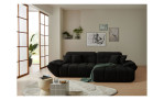 Wohnlandschaft Poppy in Schwarz mit Ottomane rechts, Microfaser-Wohnlandschaft im Wohnzimmer mit Couchtisch und Teppich.