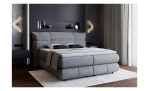 Boxspringbett Camila in der Farbe grau, in einem Raum stehend
